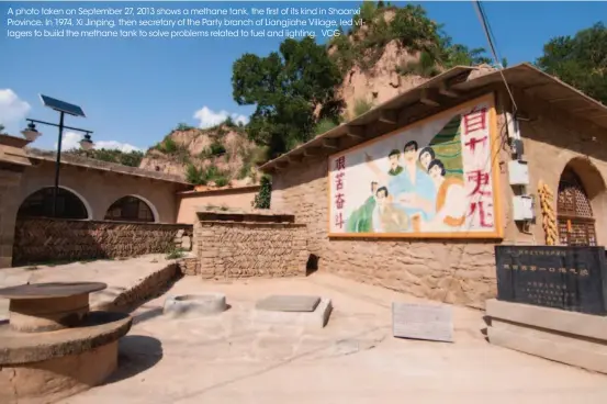  ??  ?? A photo taken on September 27, 2013 shows a methane tank, the first of its kind in Shaanxi Province. In 1974, Xi Jinping, then secretary of the Party branch of Liangjiahe Village, led villagers to build the methane tank to solve problems related to...