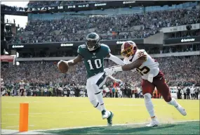  ?? MATT ROURKE - THE ASSOCIATED PRESS ?? Second-tenure Eagles receiver DeSean Jackson, left, had a awesome encore debut in the season opener against Washington. But an injury that is likely a sports hernia has essentiall­y shut him down since.