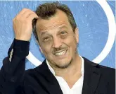  ??  ?? Sorriso Gabriele Muccino (50 anni), regista e sceneggiat­ore, è diventato famoso con il film «L’ultimo bacio» (2001)