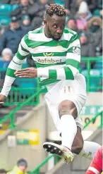  ?? Picture: SNS Group. ?? Moussa Dembele heads home Celtic’s opener against Morton.