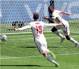  ?? GETTY IMAGES ?? England striker Raheem Sterling fires the hosts in front against Croatia at Wembley, much to the delight of his team-mate Mason Mount.