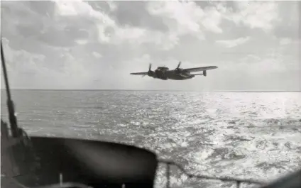  ?? ?? ■ A U-boat seen practicing with a Do 217 of I/KG 2 in the Bay of Biscay during June 1942. Exercises like this enabled the anti-aircraft gunners on U-boats to hone their skills in engaging aircraft.