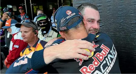  ?? DANIEL KALISZ/GETTY IMAGES ?? Shane Van Gisbergen congratula­ted by his father after the race.