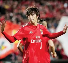  ??  ?? Joao Felix celebrates after scoring a goal during the UEFA Europa league quarter final first leg match between SL Benfica and Eintracht Frankfurt at the Luz stadium in Lisbon. — AFP photo