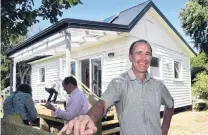  ?? PHOTO : PETER MCINTOSH ?? Has to go . . . Scott Willis at the opening of the Climate Safe House in Waitati.