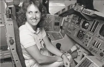  ?? Associated Press 1985 ?? Teacher Christa McAuliffe and six crewmates died aboard space shuttle Challenger on Jan. 28, 1986. She was going to experiment with fluids and demonstrat­e Newton’s laws of motion.