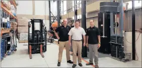  ??  ?? Vuka Floors sales manager Steven Lange with directors Michael Cook, centre, and Paul Clark at the business’s factory in Cornubia.