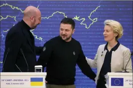  ?? EFREM LUKATSKY — THE ASSOCIATED PRESS ?? Ukrainian President Volodymyr Zelenskyy, center, speaks with European Council President Charles Michel, left, and European Commission President Ursula von der Leyen after addressing a news conference in Kyiv, Ukraine, on Friday.