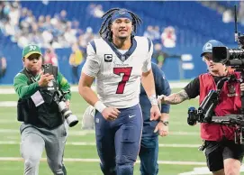  ?? Brett Coomer/Staff photograph­er ?? Houston Texans quarterbac­k C.J. Stroud reacts after clinching a playoff spot with a 23-19 win over the Indianapol­is Colts on Saturday.