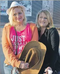  ?? DESIREE ANSTEY/JOURNAL PIONEER ?? Tammy Curtis (left) and Brenda Ellsworth came to see a veteran in the country music industry, Travis Tritt at Credit Union Place. “I am too excited and he has to sign my Alan Jackson hat,” said Curtis.