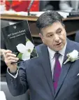  ?? NATHAN DENETTE /THE CANADIAN PRESS ?? Ontario Finance Minister Charles Sousa delivers the 2017 Ontario budget at Queen’s Park in Toronto on Thursday.