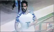  ?? HT PHOTO ?? A CCTV grab shows an assailant with a gun in his hand outside a gym at Khasa, near Amritsar, on Thursday.