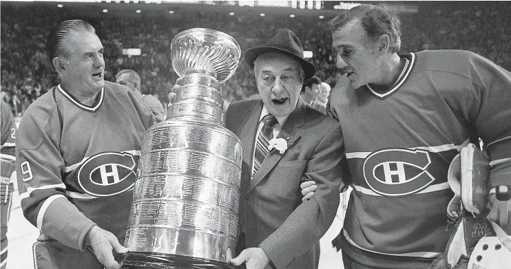  ?? — PHOTOS: THE CANADIAN PRESS FILES ?? Under the guidance of coach Toe Blake, middle, the Habs won eight Stanley Cups, including five in a row in the 1950s. The Canadiens celebrated the reunion of the 1959-60 team on Dec. 17, 1983, in Montreal. With Blake is Maurice ‘Rocket’ Richard, left,...