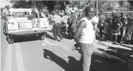  ??  ?? A police vehicle carries a metal coffin bearing the body of a Mckeurtan Primary School pupil who was knocked down by a car along 3rd Avenue Extension in Bulawayo yesterday