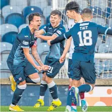  ??  ?? Kyle Benedictus celebrates scoring Rovers’ equaliser.