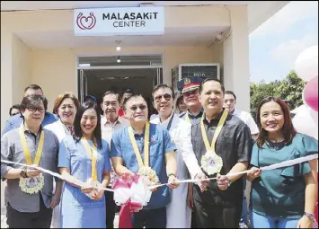  ?? BOY SANTOS ?? Sen. Christophe­r ‘Bong’ Go, Quezon City Mayor Joy Belmonte, Presidenti­al Assistant for the Visayas Michael Lloyd Dino and Quezon City Rep. Bong Suntay lead the recent unveiling of the Malasakit Center at the Novaliches District Hospital. The center, which is a one-stop shop for patients seeking financial assistance from various government agencies, is the first one to be based in a hospital run by the local government unit.