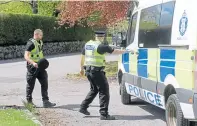  ??  ?? Police at Hazlehead Park, Aberdeen, where fears of an anti-lockdown protest were not realised