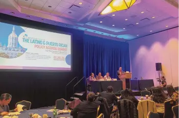  ?? Lau Guzmán/Hearst Connecticu­t Media ?? At left: State Reps. Hilda Santiago, D, Meriden, Geraldo Reyes, D, Waterbury, and Antonio Felipe, D, Bridgeport, and moderator Ana Alfaro speak at the first Connecticu­t Latino and Puerto Rican Policy Agenda Summit on Saturday.