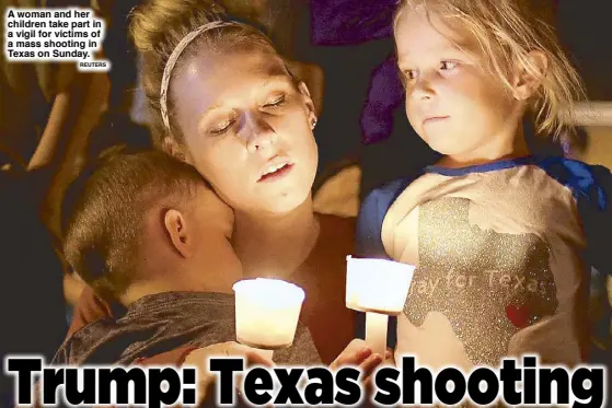  ?? REUTERS ?? A woman and her children take part in a vigil for victims of a mass shooting in Texas on Sunday.