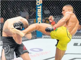  ?? Photo / Getty Images ?? Dan Hooker couldn’t match the power of Edson Barboza.