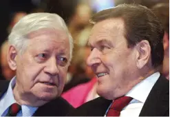  ??  ?? HAMBURG: Picture taken on October 26, 2007 shows former German chancellor­s Gerhard Schroeder and Helmut Schmidt during the first day of the Social Democratic Party (SPD) congress in Hamburg. Former West German chancellor Helmut Schmidt died yesterday...