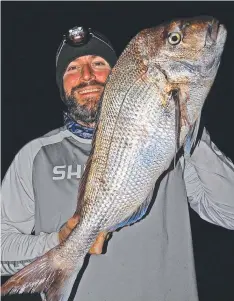  ??  ?? Chris Stamalos with his 6.8kg snapper from Point Richards.