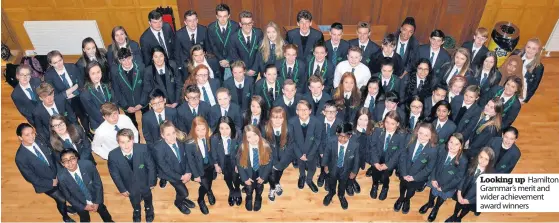  ??  ?? Looking up Hamilton Grammar’s merit and wider achievemen­t award winners