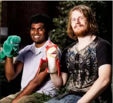  ??  ?? NICK HILLEMANN/RIVER VALLEY & OZARK EDITION Hendrix College seniors Anvesh Kompelli, left, and Xan Clark will conduct a puppet workshop on Sept. 26 and Oct. 1 and 3 at the Faulkner County Library. The workshop is in preparatio­n for public performanc­es...