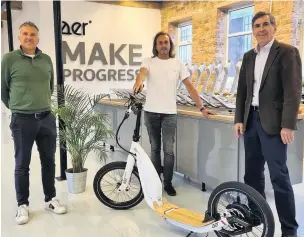  ??  ?? MP David Rutley (right) visits AER to meet Nigel Speak (left) and founder John Irving