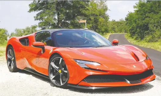  ?? PHOTOS: DAVID BOOTH/DRIVING ?? The 2021 Ferrari SF90 Stradale is the legendary Italian automaker's first plug-in hybrid and it offers 25 kilometres of emissions-free motoring.