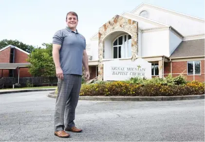  ?? STAFF PHOTO BY ERIN O. SMITH ?? Dr. Sam Greer, senior pastor of Red Bank Baptist Church, stands before Signal Mountain Baptist Church, which Red Bank Baptist is in the process of acquiring.