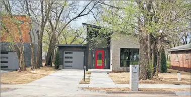  ??  ?? Above: Jeff Click built this home at 1716 NE 16 in a partnershi­p with Sandino Thompson to redevelop a city block they call NE16. Below: A home built by the partnershi­p at 1718 NE 16. [JEFF CLICK DESIGN BUILD PHOTOS]