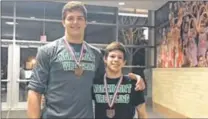  ??  ?? Ryan Cloud (left) placed third in the 285-pound weight class during the state wrestling tournament. Chase Craft (right) placed eighth in the state in the 113-pound weight class. Northmont’s wrestling team is coached by Scott Newburg.