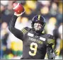  ?? Frank Gunn / Associated Press ?? Hamilton quarterbac­k Dane Evans throws during the TigerCats’ 3616 victory over Edmonton Saturday.