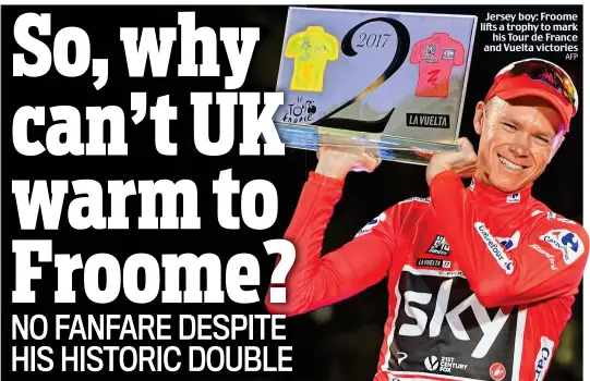  ?? AFP ?? Jersey boy: Froome lifts a trophy to mark his Tour de France and Vuelta victories