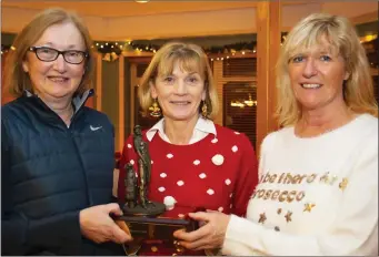  ??  ?? Treasa Byrne and Margaret Rossiter, winners of the Kathleen Pyne ladies’ matchplay in New Ross, with lady Captain Marguerite Sutton (centre).