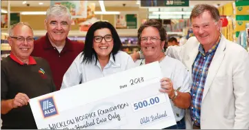  ??  ?? Aldi’s Arklow’s ‘Charity Champion’ Agnieszka Matwiejczu­k with (from left) Vincent Doran, Cllr Tom Fortune, Dessie O’Toole and Dr Brendan Cuddihy, representi­ng the Wicklow Hospice Foundation.