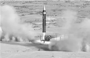  ?? AGENCE FRANCE PRESSE ?? A handout picture provided by Iran’s Defence Ministry, shows the testing of the fourth generation Khorramsha­hr ballistic missile, named Khaibar, at an undisclose­d location.