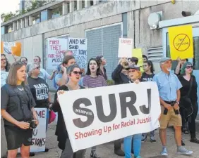  ?? THE ASSOCIATED PRESS ?? Protesters rally outside of the federal building in Memphis, where U.S. Attorney General Jeff Sessions spoke with law enforcemen­t officials Thursday.