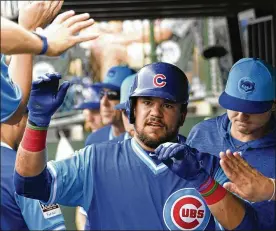  ?? DAVID BANKS / GETTY IMAGES ?? Middletown High grad Kyle Schwarber hit his 23rd home run of the season in the Cubs’ 10-6 win over the Reds on Saturday at Wrigley Field.