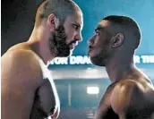  ?? MPAA rating: Running time: MGM PICTURES ?? Viktor Drago (Florian Munteanu), left, and Adonis Creed (Michael B. Jordan) prepare to fight in “Creed II.”PG-13 (for sports action violence, language and a scene of sensuality)2:08