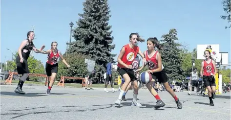  ?? JOHN LAW/POSTMEDIA NEWS ?? About 130 teams filled downtown Niagara Falls this weekend for the city’s first Gus Macker 3-on-3 basketball tournament.