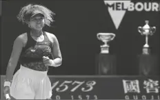  ?? ASSOCIATED PRESS ?? JAPAN’S NAOMI OSAKA reacts after defeating Taiwan’s
Hsieh Su-wei in their quarterfin­al match at the Australian Open championsh­ip in Melbourne, Australia, on Tuesday.