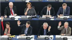  ?? FREDERICK FLORIN / AFP / GETTY IMAGES ?? Members of the European Parliament take part in a voting session on the CETA free-trade deal Wednesday.