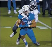  ?? JOHN LOCHER — THE ASSOCIATED PRESS ?? San Jose State wide receiver Bailey Gaither (84) catches a pass in front of Nevada defensive back Mikael Bradford during the second half Friday in Las Vegas.