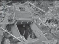  ??  ?? BUNKER: This undated photo provided by the King County Sheriff’s Department on Friday, shows a bunker that deputies say belongs to a man suspected of killing his wife and daughter and holing up for days in the Cascade foothills east of Seattle. King County Sheriff’s Sgt. Cindi West says authoritie­s pumped gas into the undergroun­d bunker and they believe someone is inside.