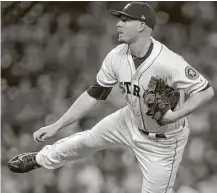  ?? Karen Warren / Houston Chronicle ?? Righthande­r Chris Devenski has been the Astros’ top weapon out of the bullpen this season, entering Saturday with a 4-3 record, three saves and 2.23 ERA over 481⁄3 innings pitched.