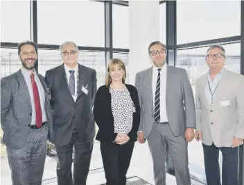  ??  ?? Steve Bowyer, left, with Peterborou­gh City Council leader Coun John Holdich, Emma Gilbert, of Heathrow Airport, Combined Authority Mayor James Palmer, and Coun Peter Hiller.