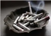  ?? DAVE MARTIN — THE ASSOCIATED PRESS ?? Anti-smoking advocates are warning that the stress and disruption­s of the COVID-19pandemic may have slowed efforts to get more Americans to quit in 2020.