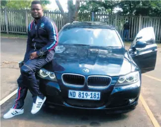  ??  ?? Joey Mdluli with his BMW that was taken by a fraudster last week